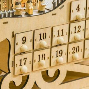Adventskalender zum Befüllen 24 Schubladen Fächer Weihnachtskalender mit LED-Lichtern Schlitten-Form