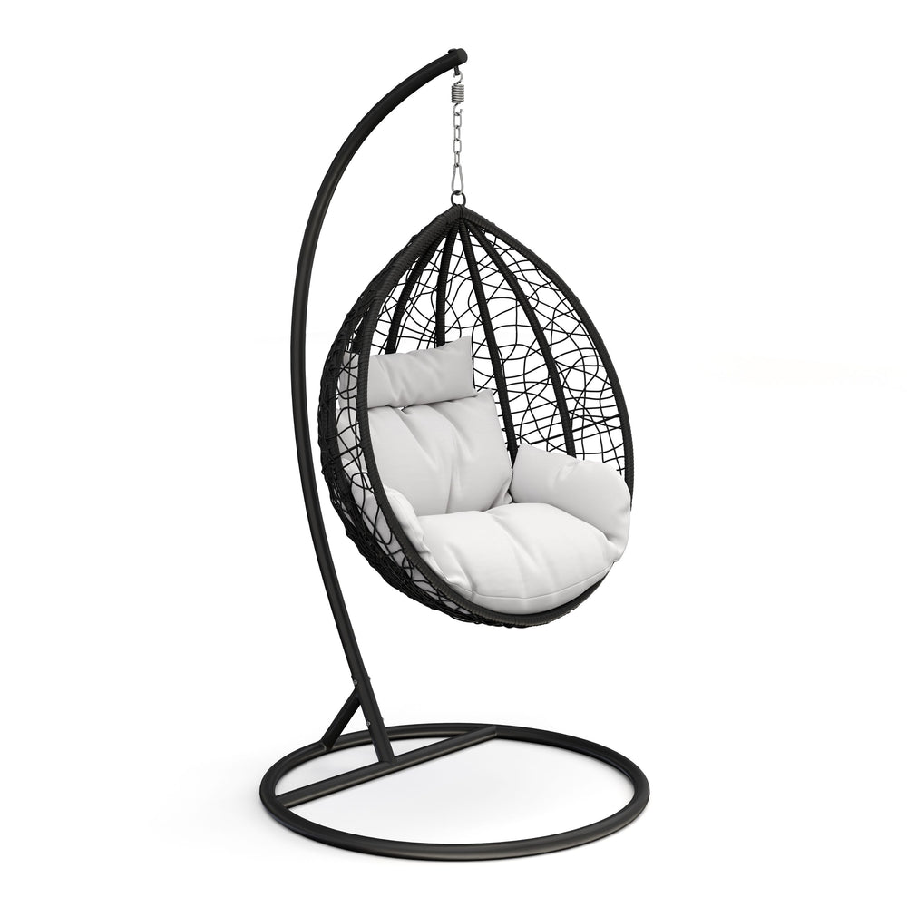 Fauteuil œuf noir avec coussins blancs