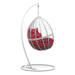 Eiersessel weiss mit roten Kissen