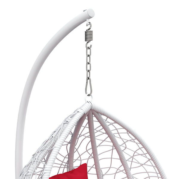 Eiersessel weiss mit roten Kissen