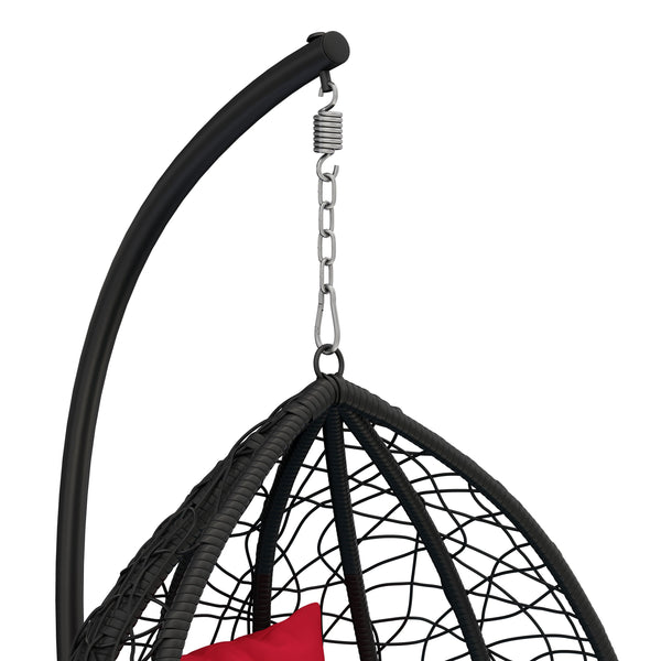 Eiersessel schwarz mit roten Kissen