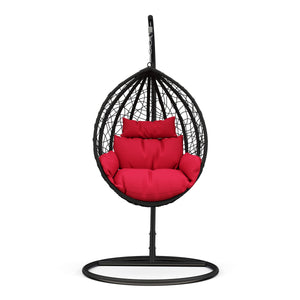 Eiersessel schwarz mit roten Kissen