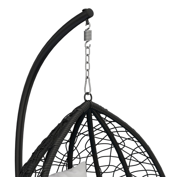Eiersessel schwarz mit weissen Kissen