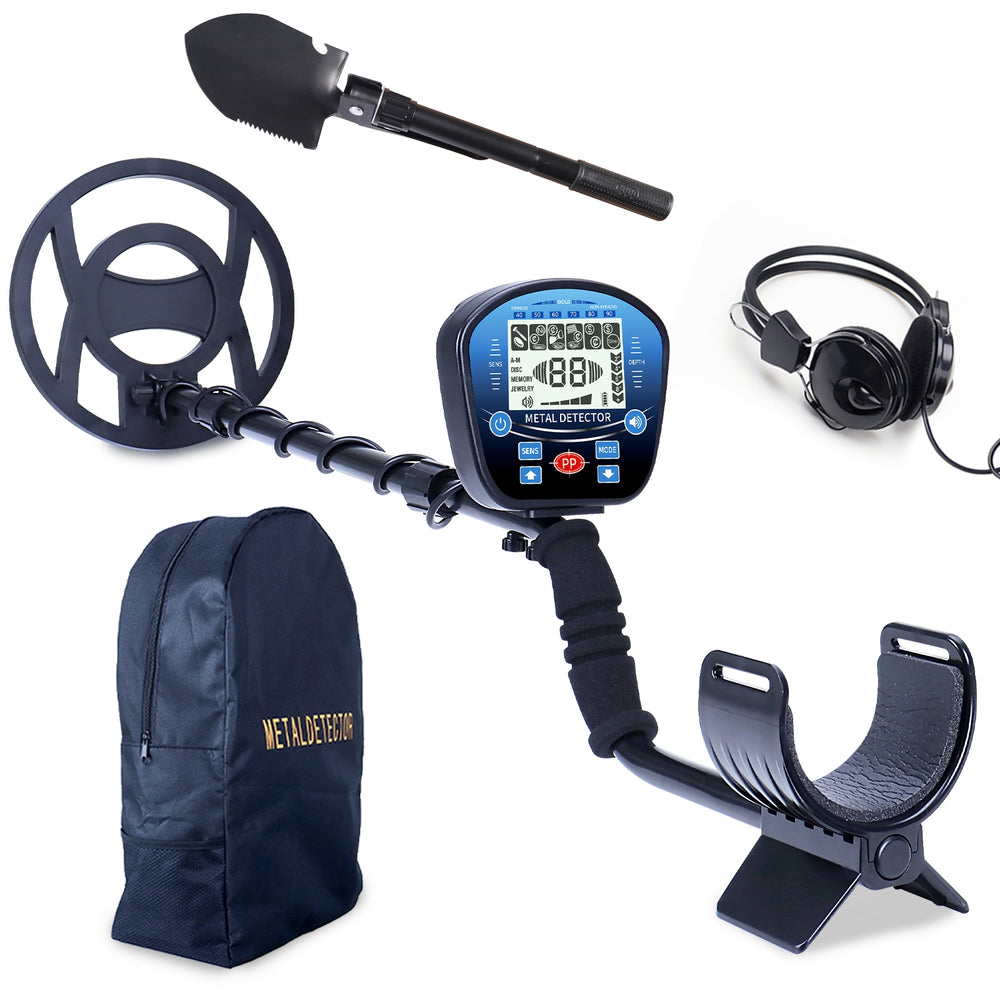 Metal detector set with headphones and shovel
